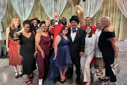 The Great Lakes Water Authority Public Affairs team and some family members were on hand to receive their Emmy Award