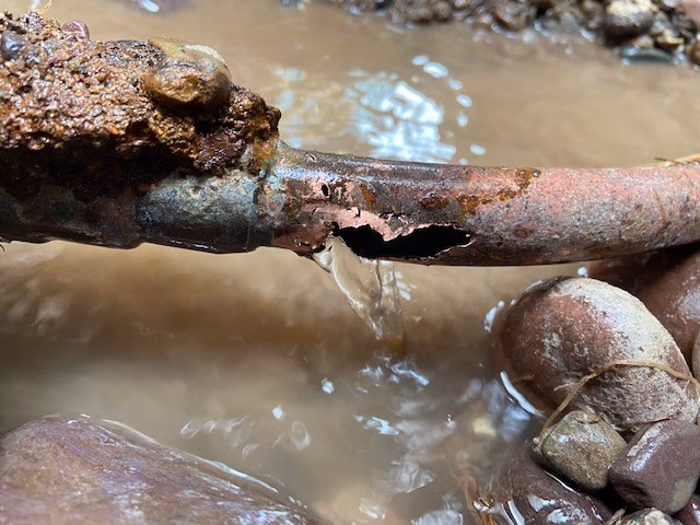 A typical leak on a copper service line.