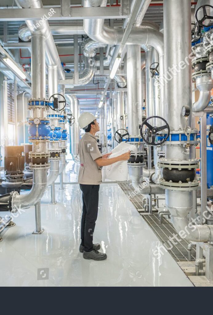 stock-photo-young-man-mechanical-engineer-holding-drawing-to-checking-and-inspection-of-hvac-heating-1741929506